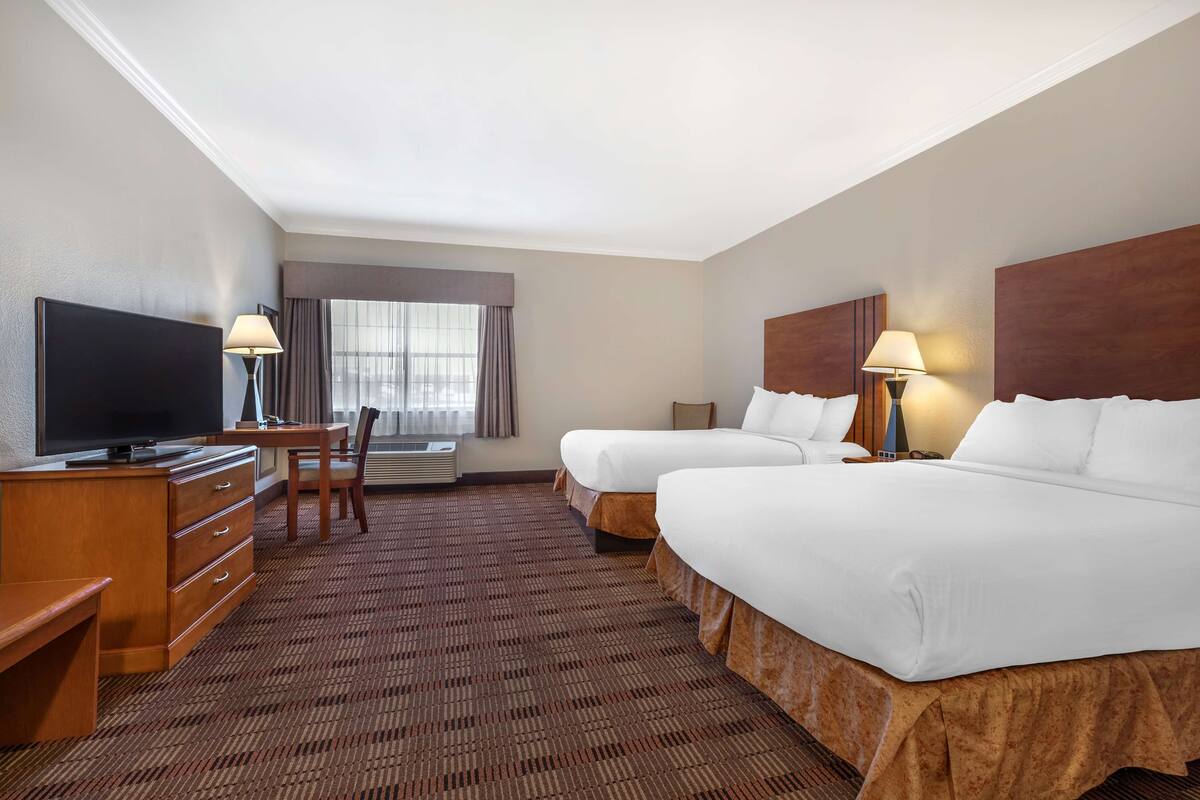 standard room, 2 queen beds, non smoking, refrigerator & microwave | 1 bedroom, premium bedding, in-room safe, desk