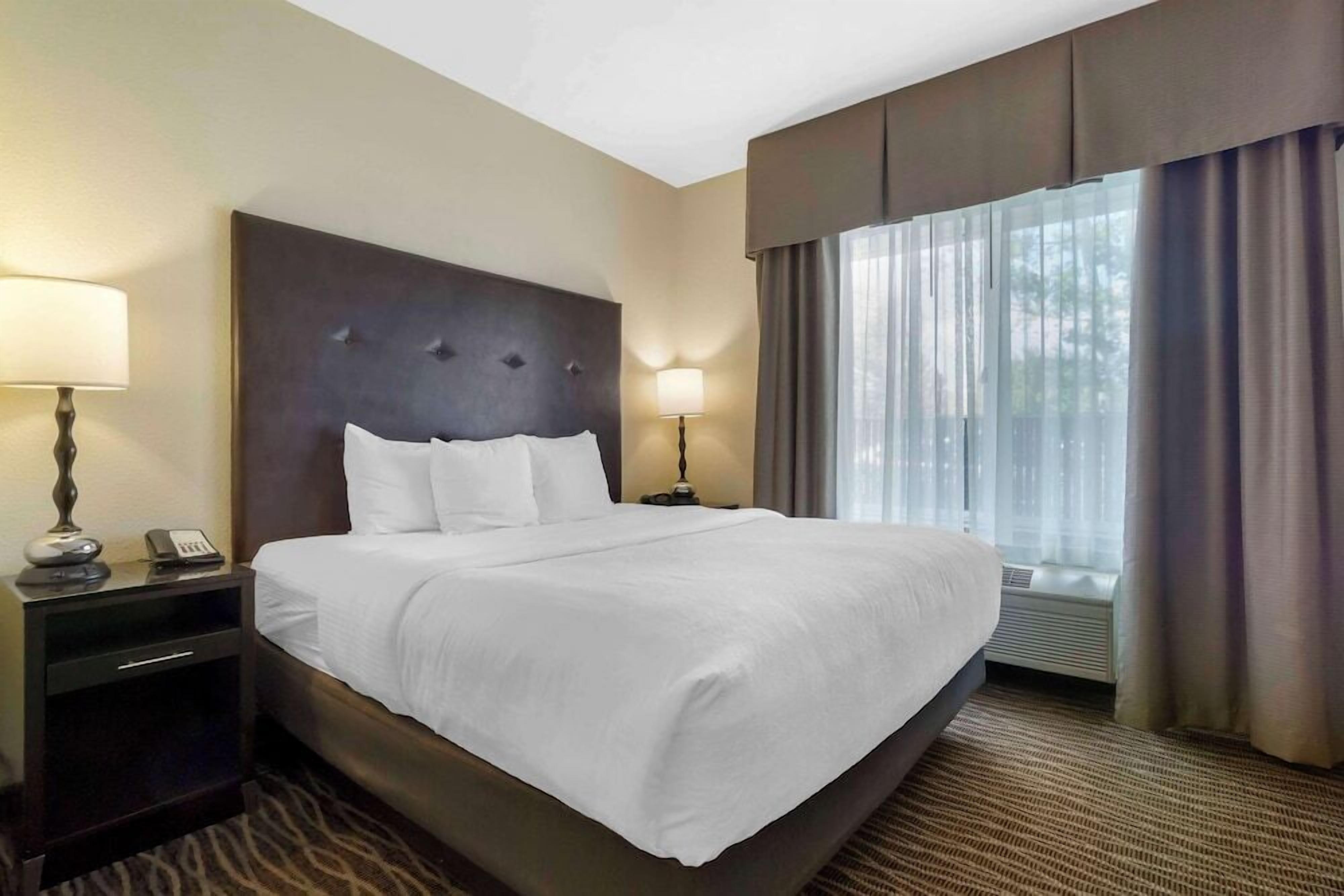 In-room safe, desk, blackout curtains, iron/ironing board