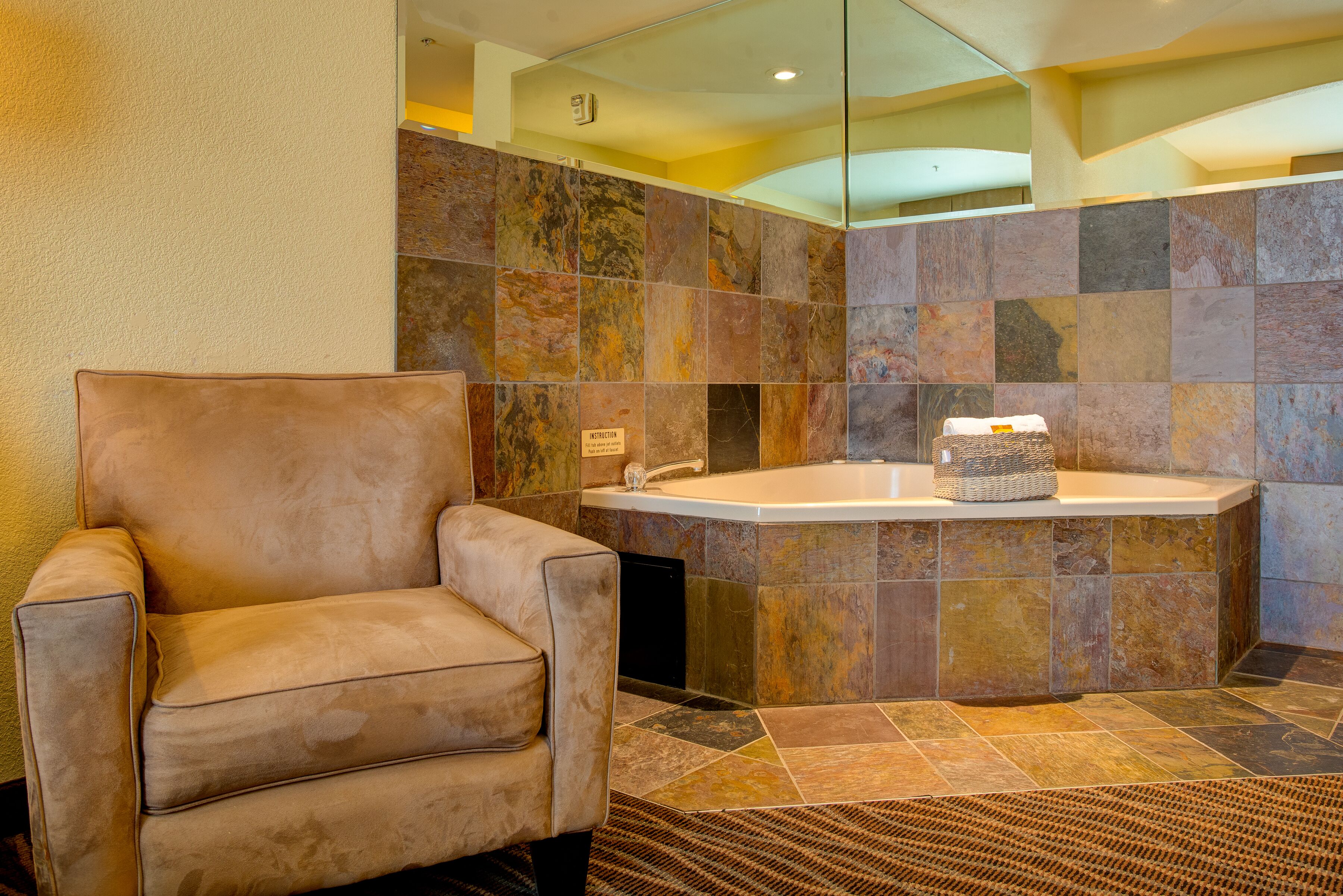 suite, 1 king bed, non smoking, jetted tub | in-room safe, desk, blackout curtains, iron/ironing board