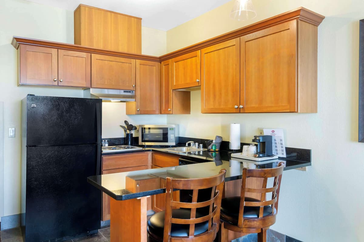 in-room safe, desk, blackout curtains, iron/ironing board