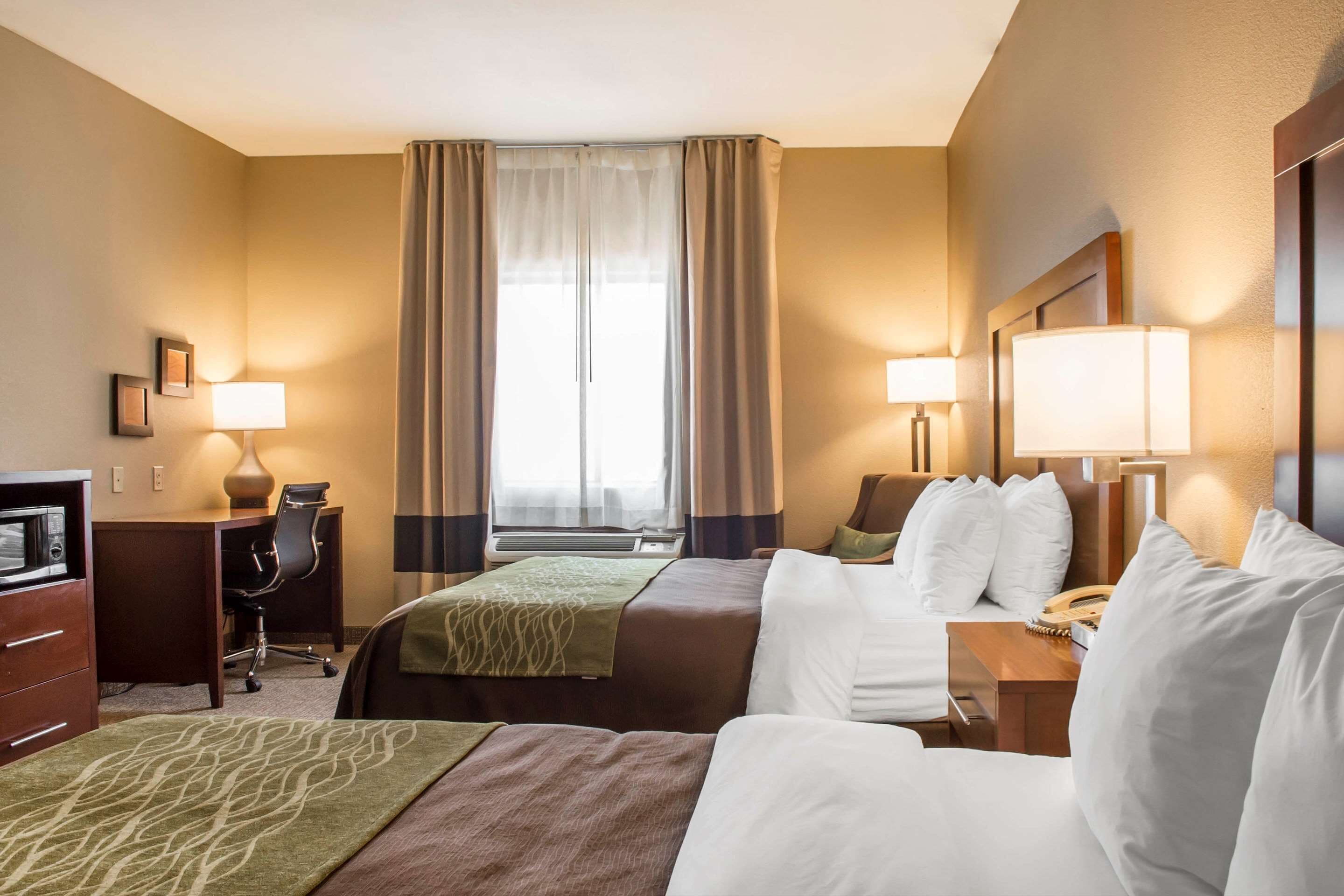 suite, 2 queen beds, non smoking | desk, laptop workspace, iron/ironing board, free cots/infant beds