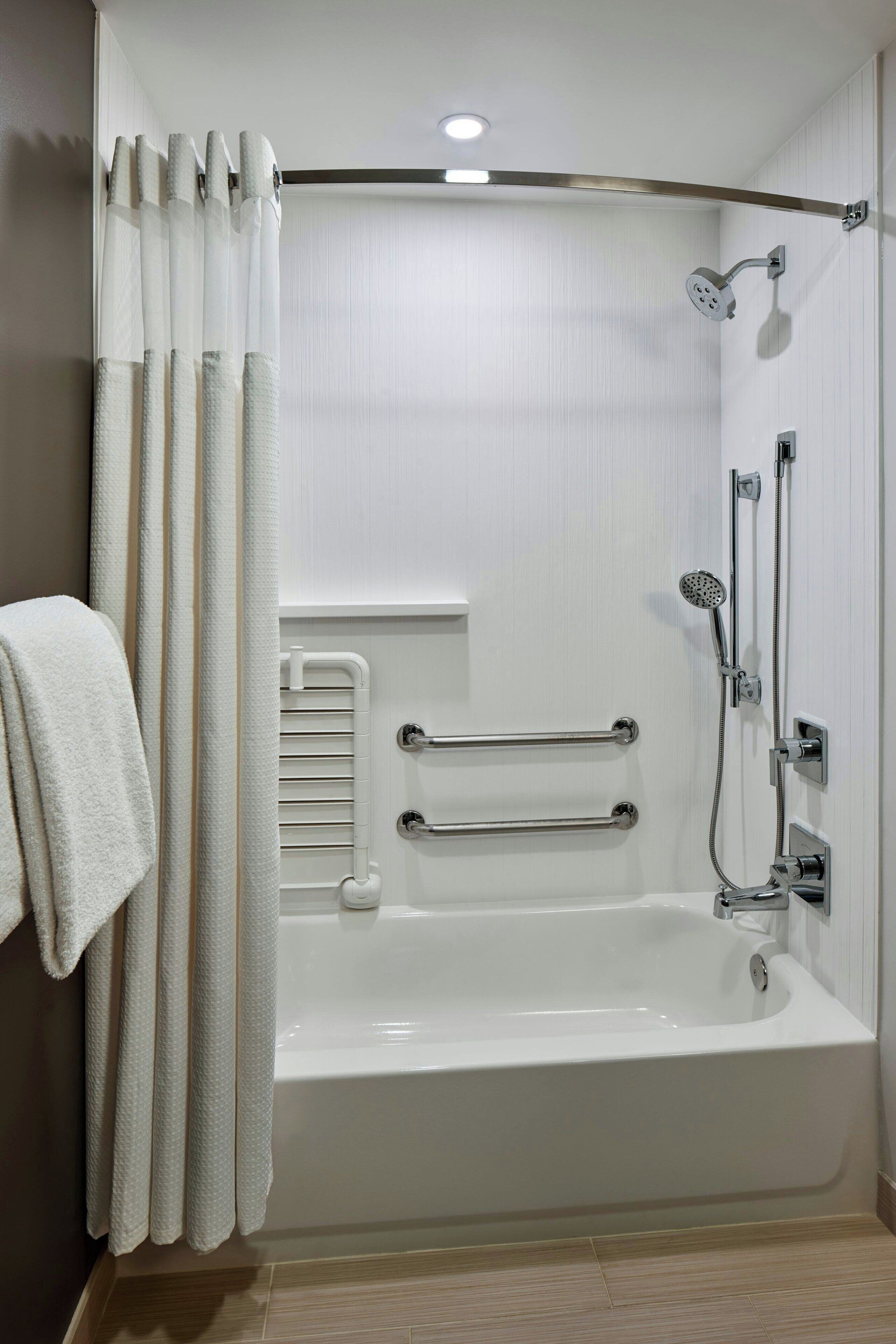 combined shower/bathtub, free toiletries, hair dryer, towels
