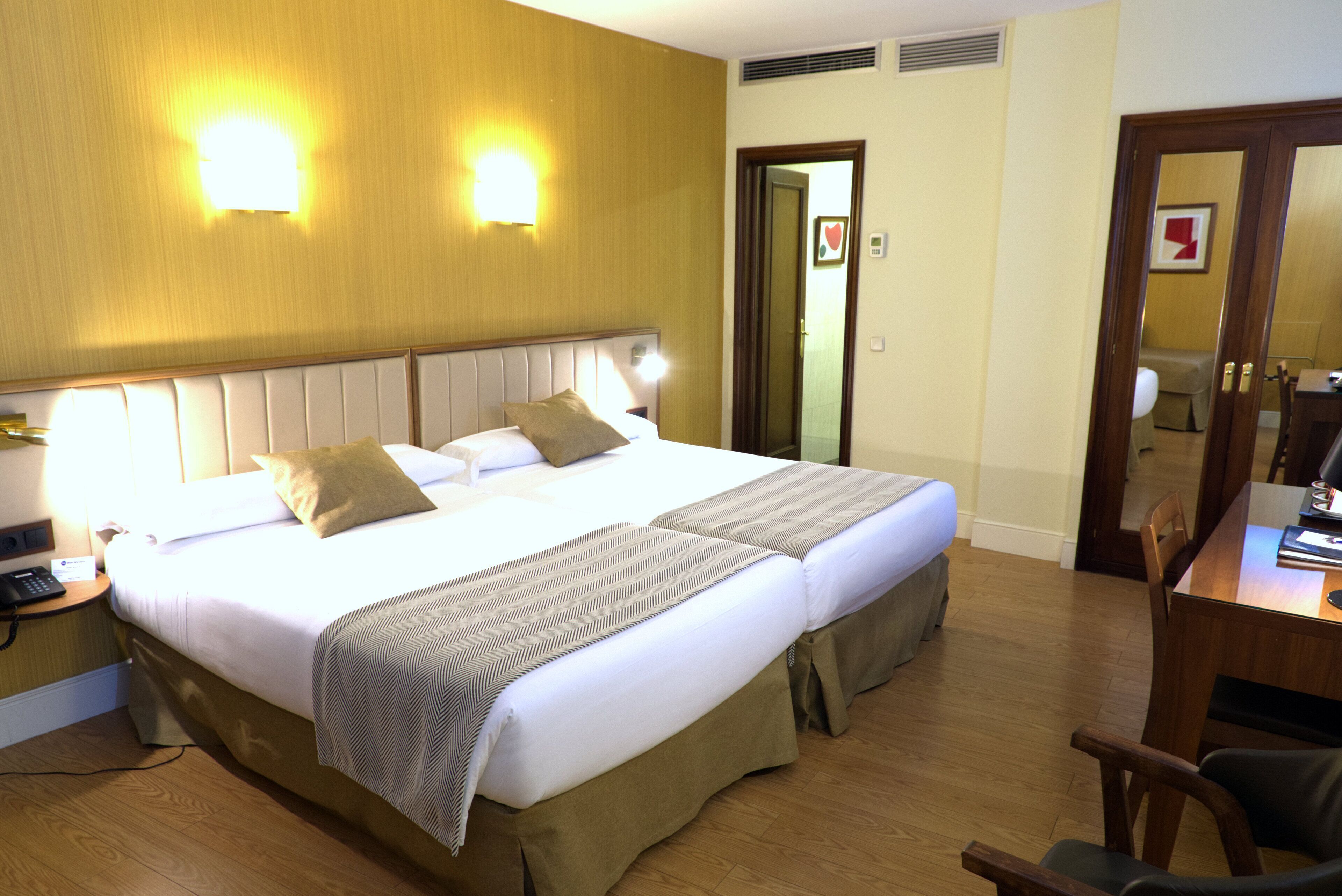 Egyptian cotton sheets, premium bedding, down duvets, minibar