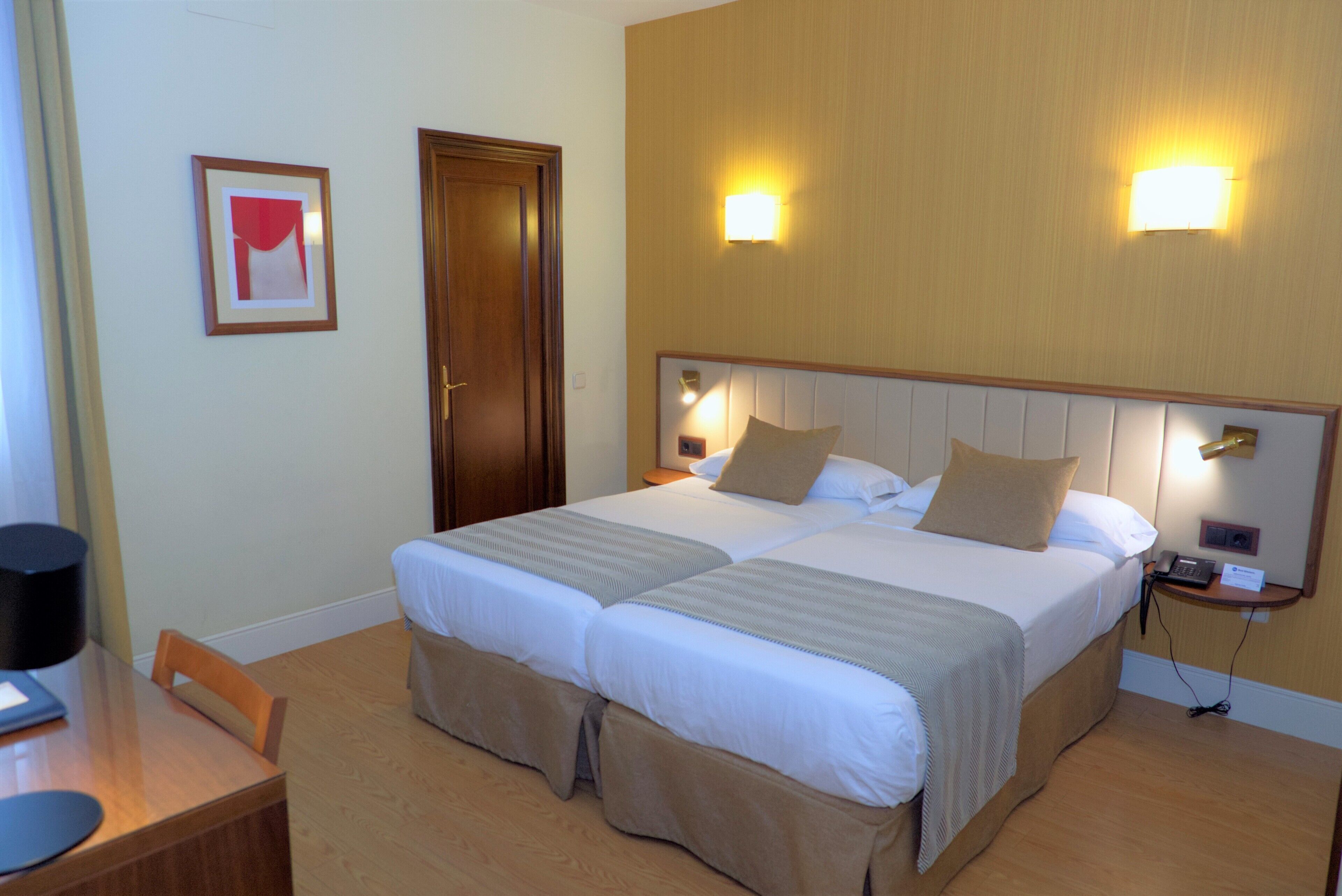Egyptian cotton sheets, premium bedding, down duvets, minibar