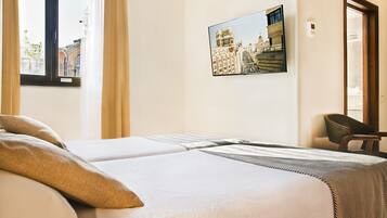 Egyptian cotton sheets, premium bedding, down comforters, minibar