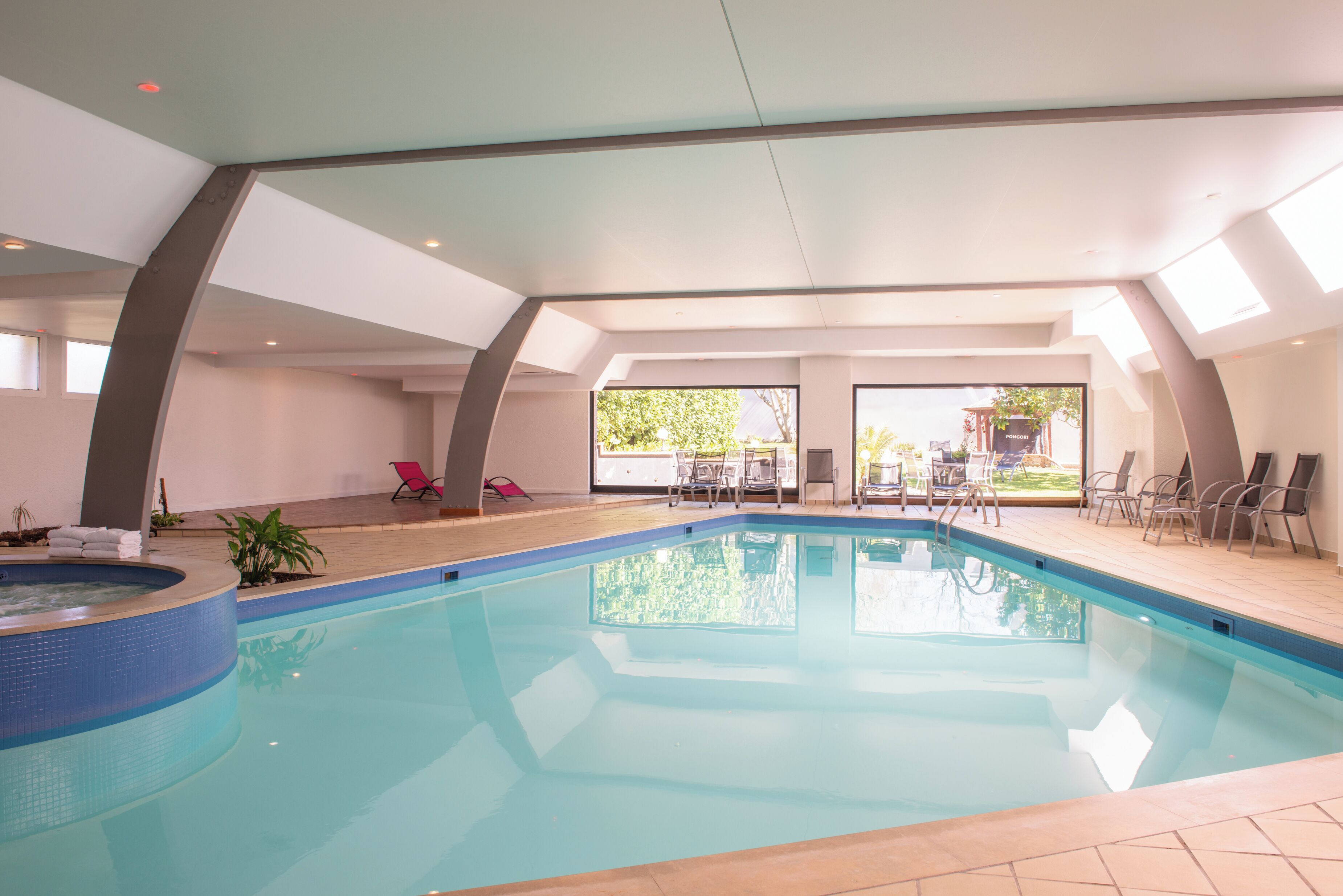 indoor pool, open 9:00 am to 8:30 pm, pool loungers