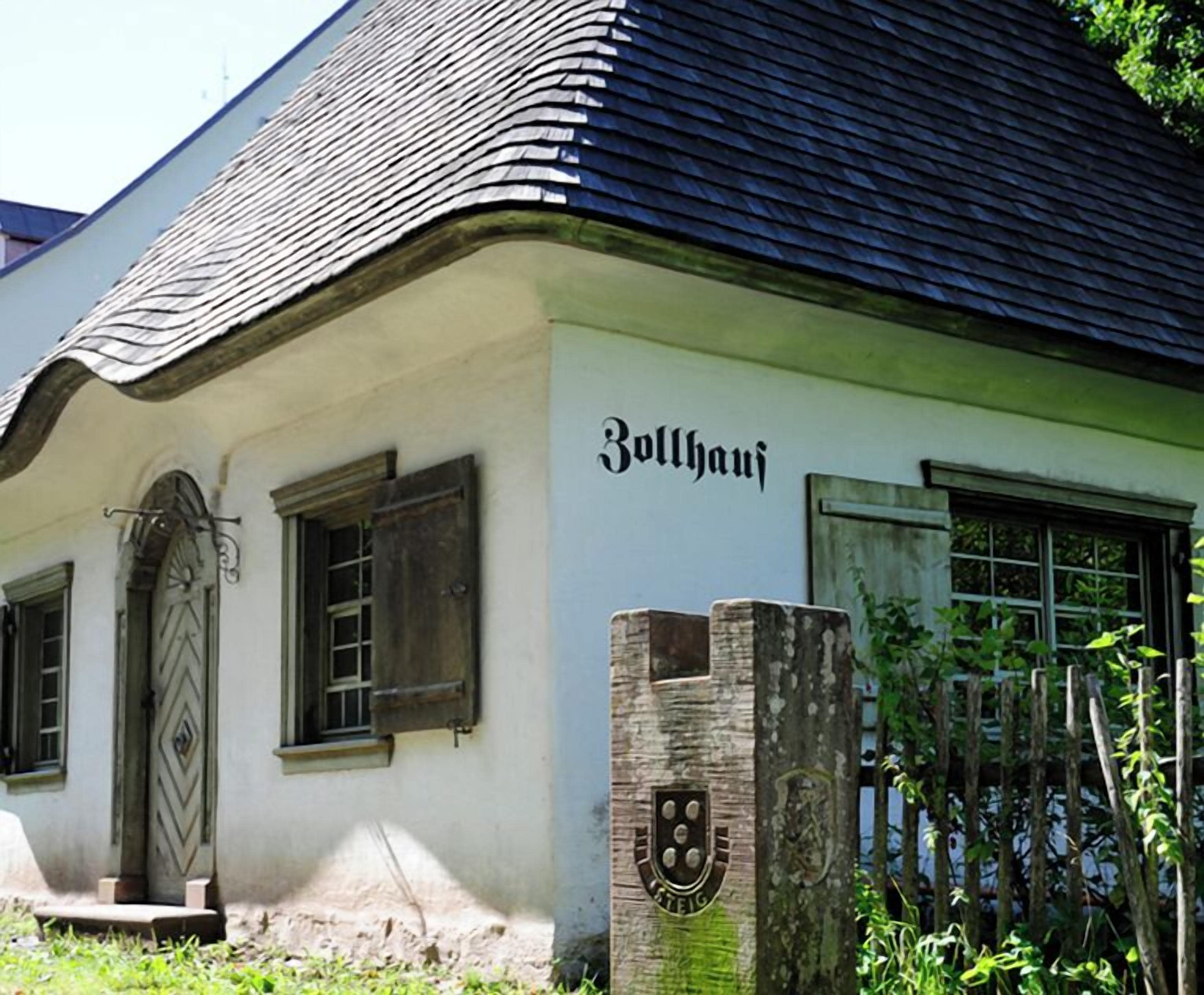A traditional building with a sign reading "Zollhaus".