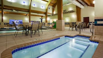Indoor pool, open 8 AM to 11 PM, pool loungers