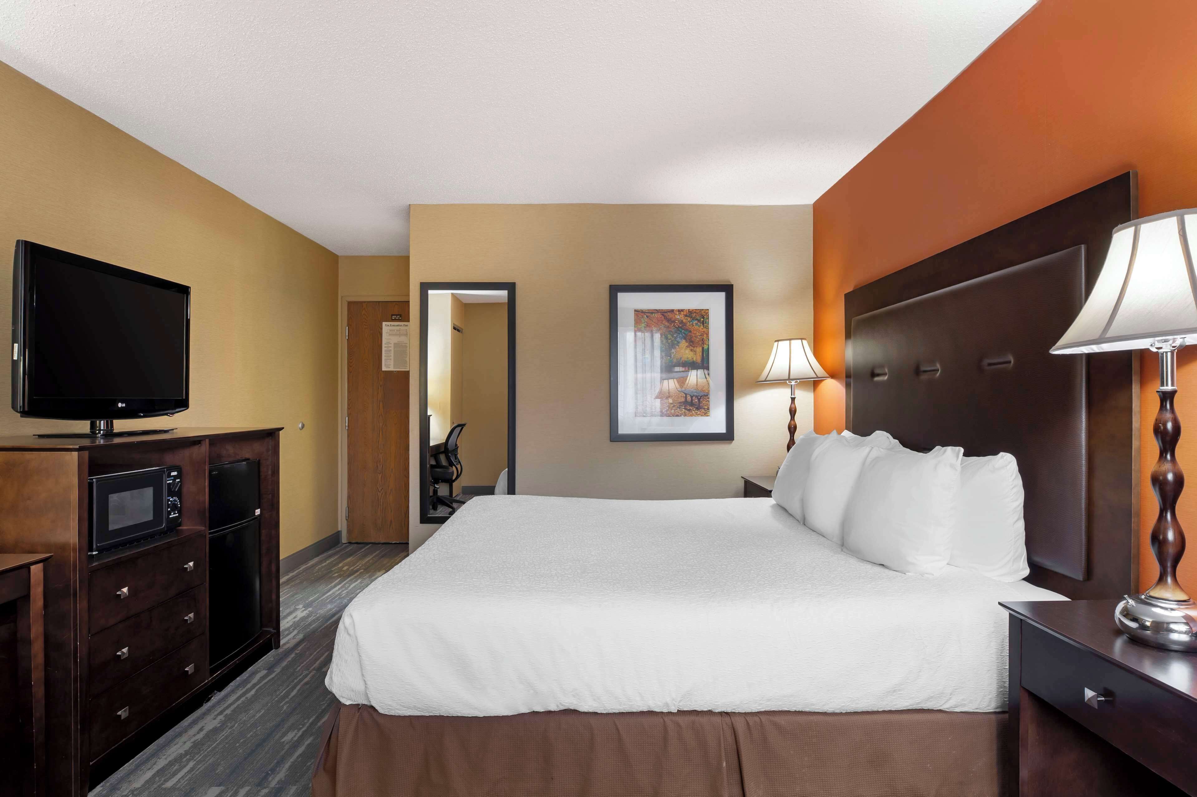 Desk, blackout drapes, iron/ironing board, free cribs/infant beds