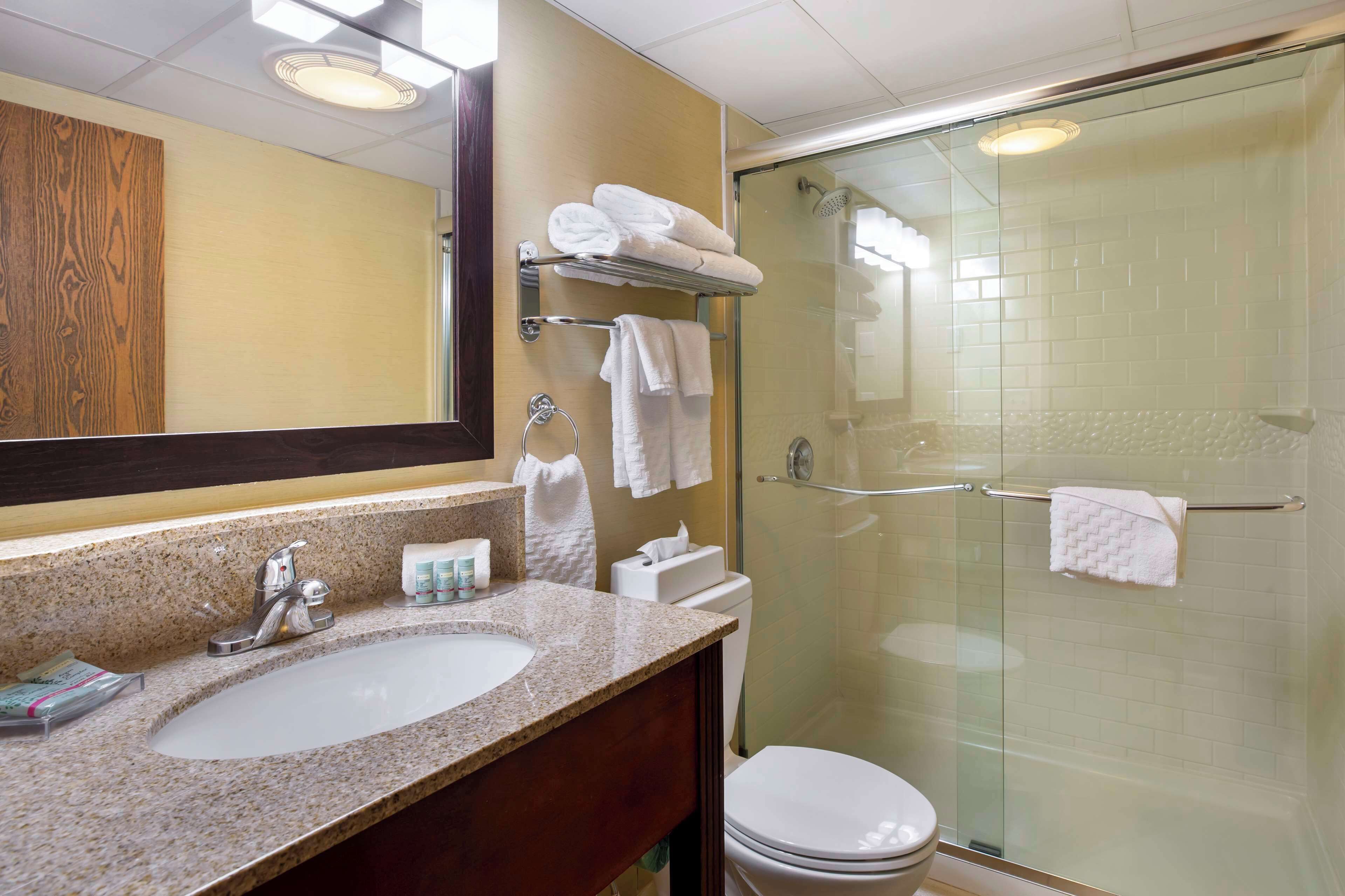 standard room, 2 queen beds, non smoking, refrigerator & microwave | bathroom | combined shower/bathtub, hair dryer, towels