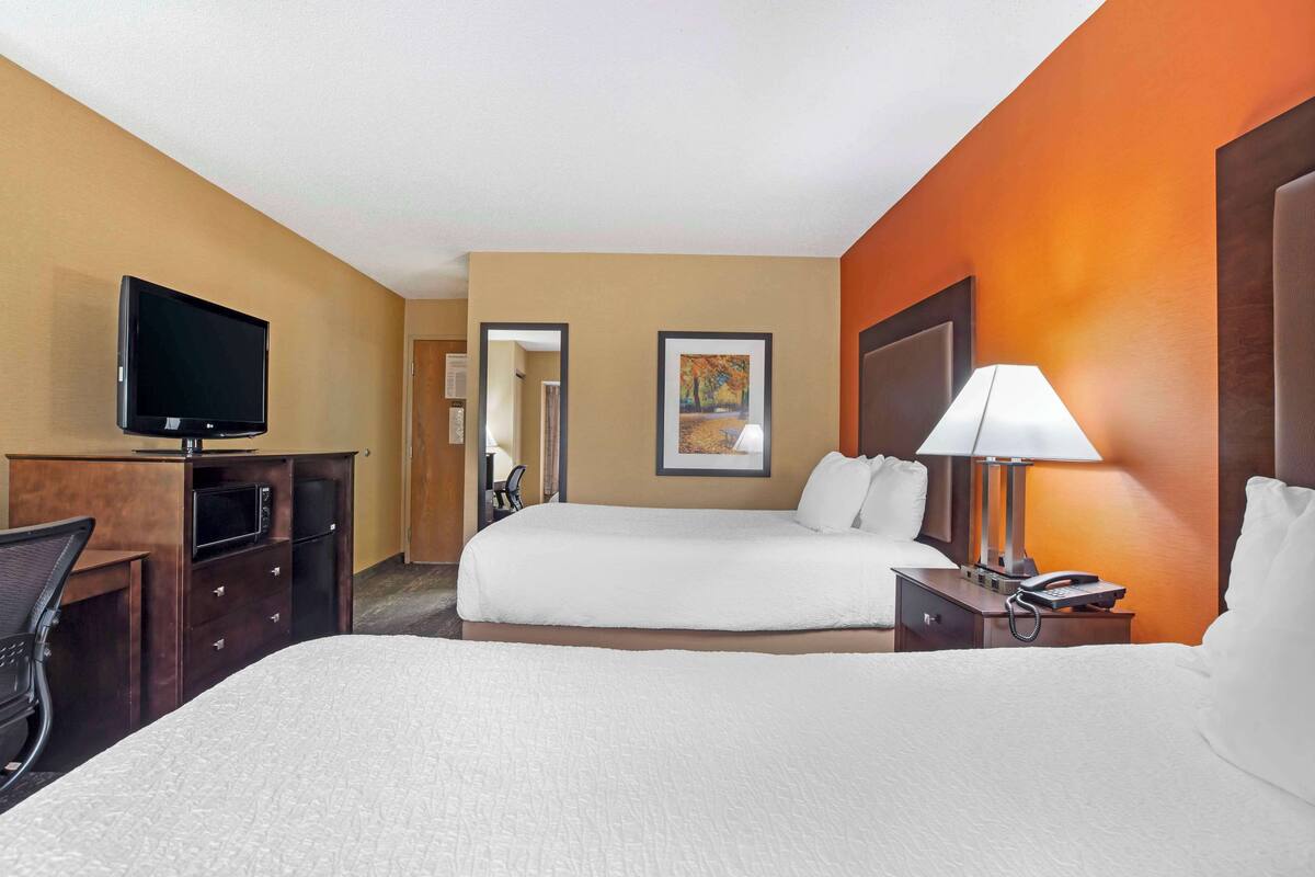 desk, blackout curtains, iron/ironing board, free cots/infant beds