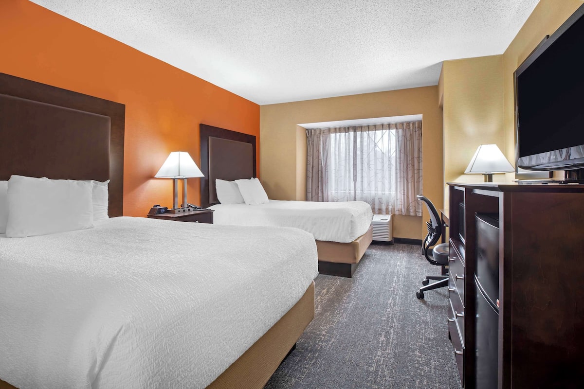 desk, blackout curtains, iron/ironing board, free cots/infant beds