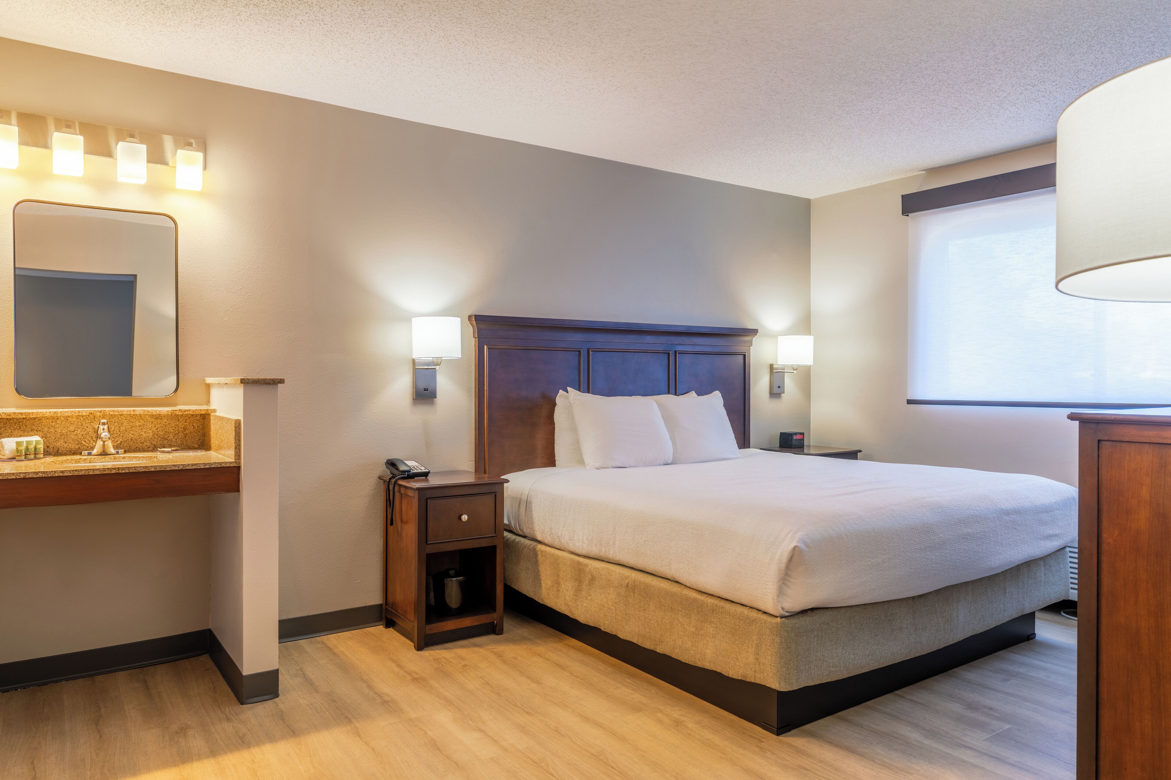 Desk, blackout drapes, iron/ironing board, free cribs/infant beds