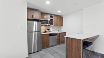 Suite, 1 King Bed, Non Smoking | Private kitchen