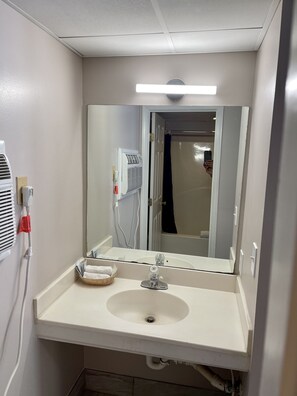 Standard Room, 2 Queen Beds, Non Smoking | Bathroom | Combined shower/tub, free toiletries, hair dryer, towels