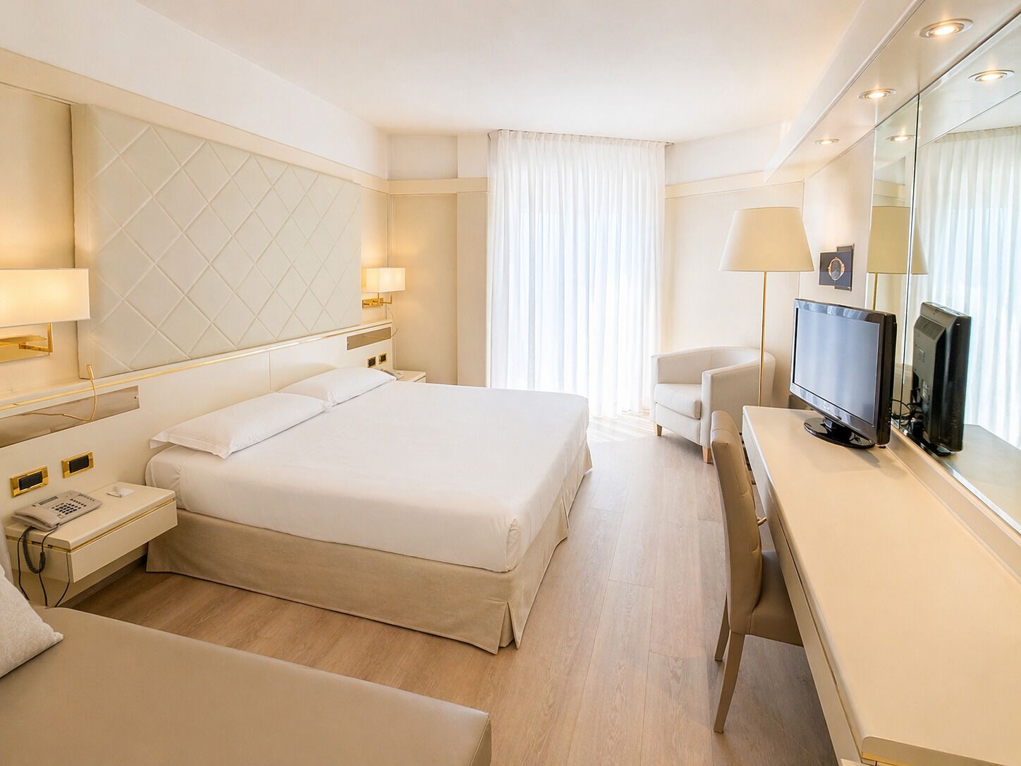 Superior Triple Room | Minibar, in-room safe, desk, soundproofing