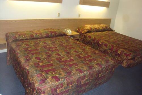 Standard Room, 2 Queen Beds | Desk, iron/ironing board, free WiFi, bed sheets