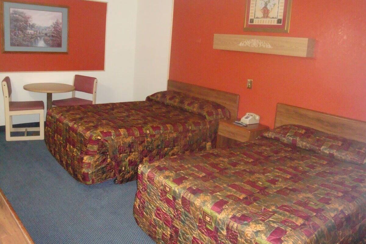 Room, 2 Queen Beds, Non Smoking | Desk, iron/ironing board (on request), free WiFi, bed sheets