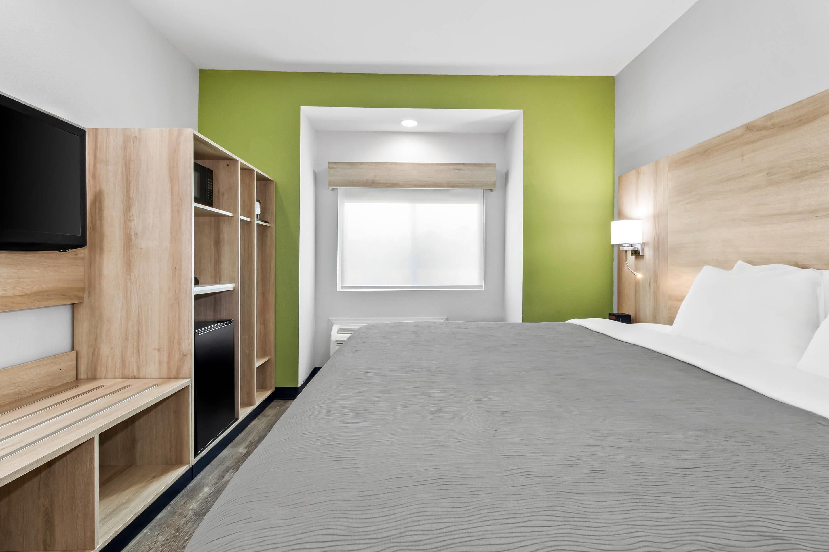 1 bedroom, premium bedding, laptop workspace, blackout curtains