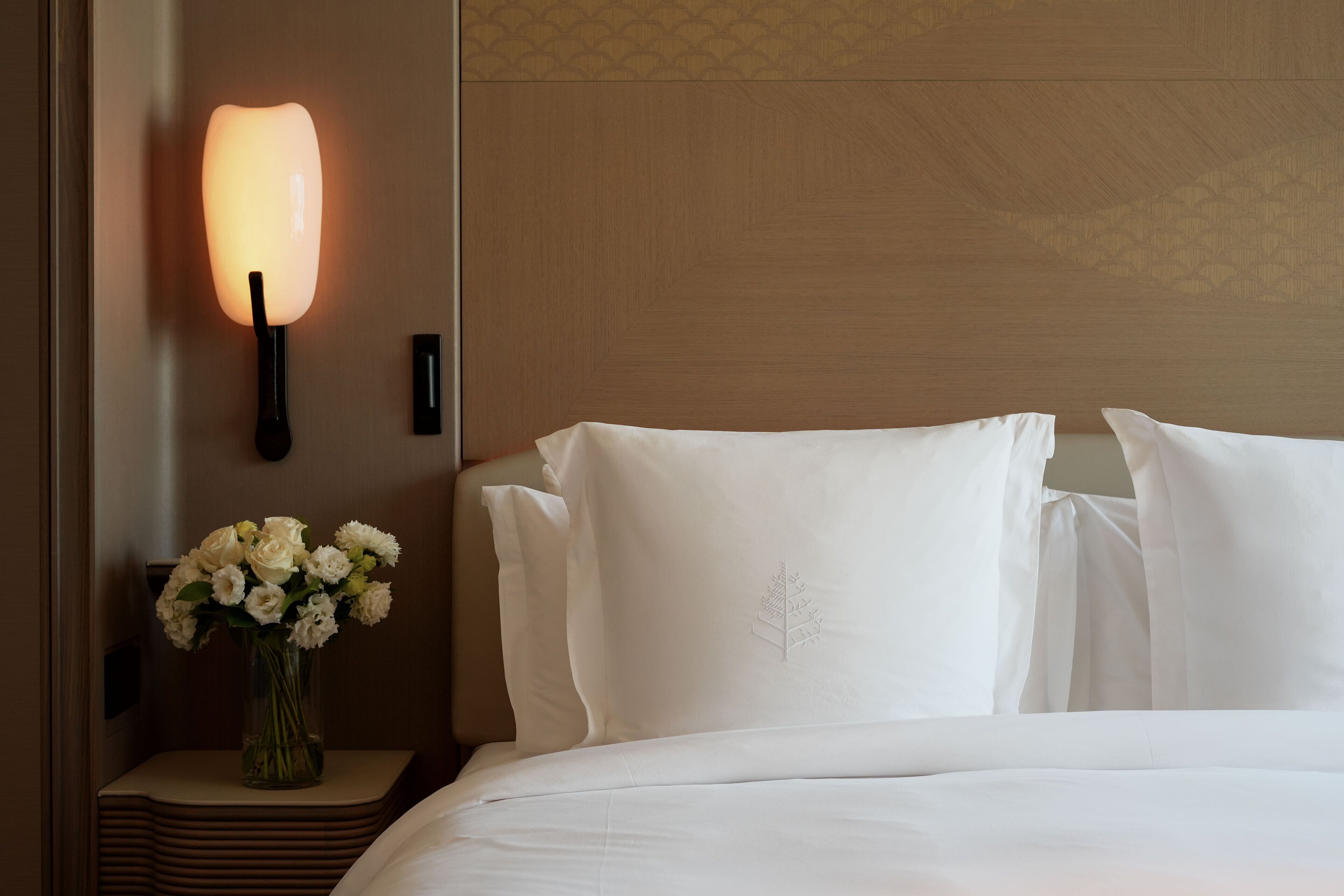 Hypo-allergenic bedding, down comforters, minibar, in-room safe