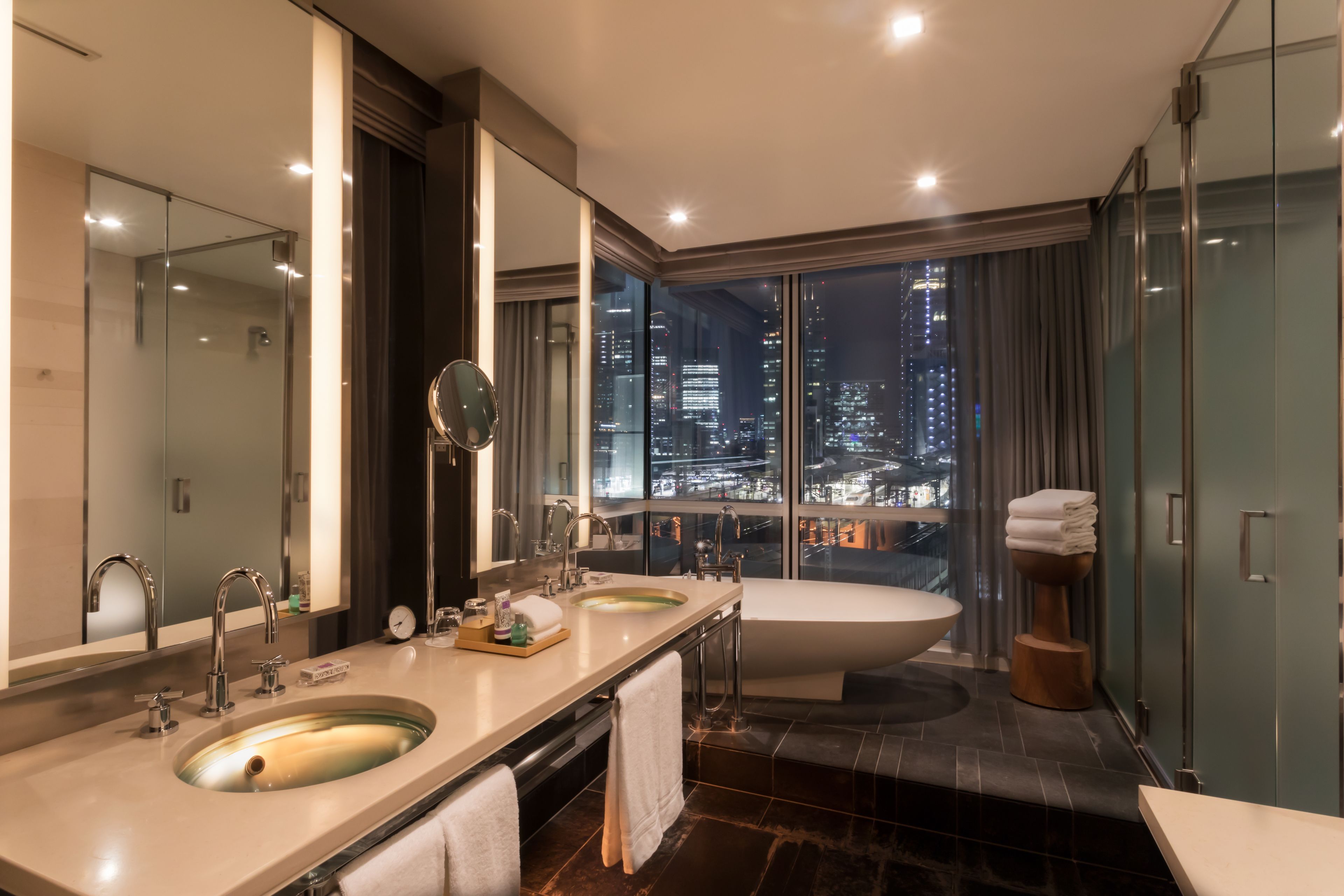 separate bathtub and shower, deep-soaking bathtub, rainfall showerhead