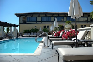 Outdoor pool, open 6:00 AM to 10:00 PM, pool umbrellas, sun loungers