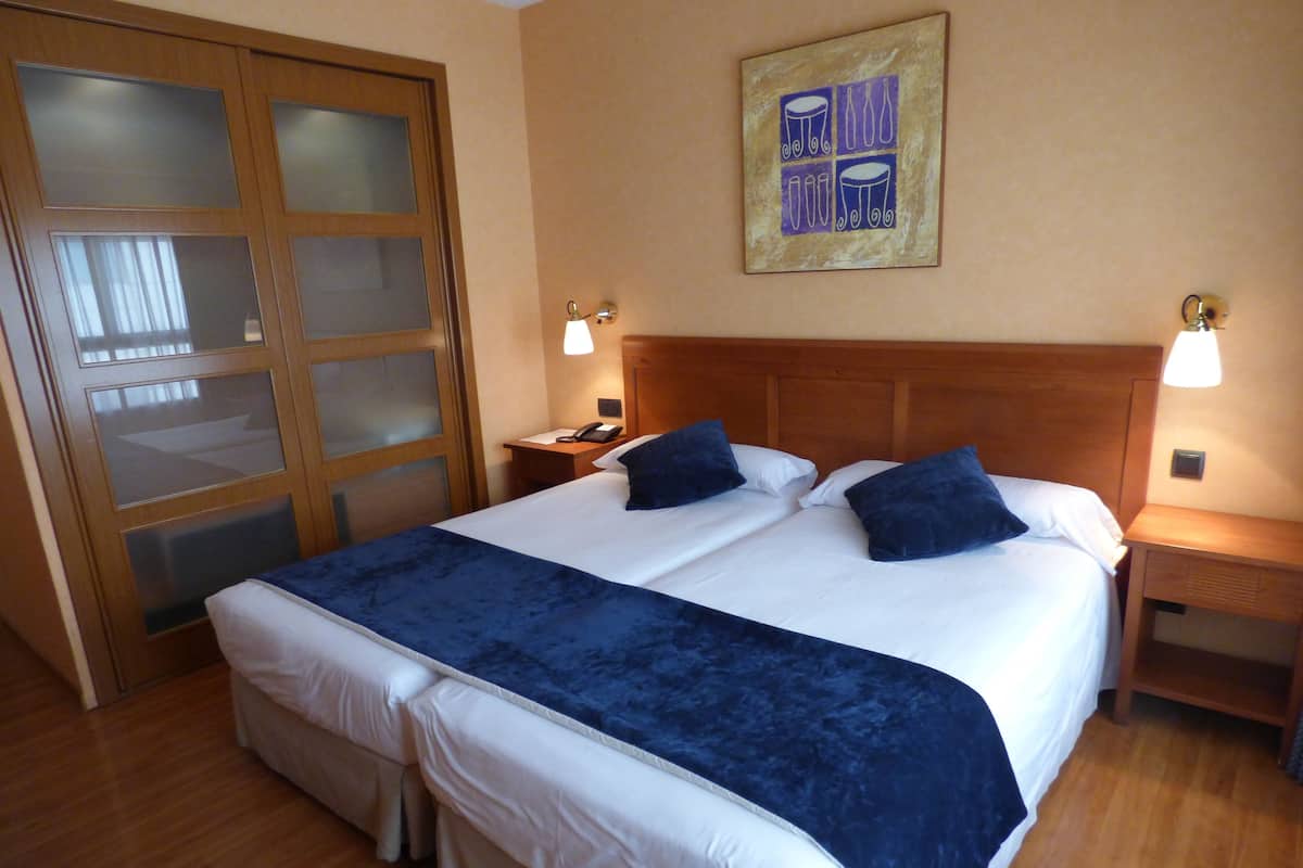 Couette en duvet d'oie, minibar, coffres-forts dans les chambres, bureau