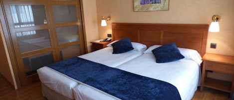 Down duvets, minibar, in-room safe, desk