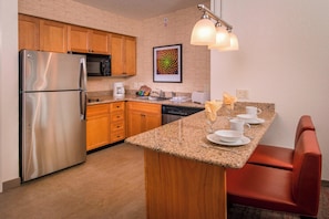 Studio, 1 Queen Bed with Sofa bed | Private kitchen | Full-size fridge, microwave, stovetop, dishwasher