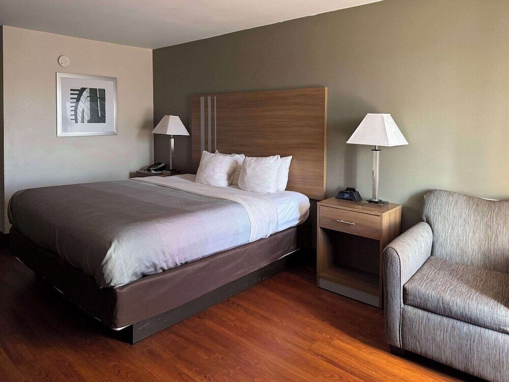 Pillowtop beds, desk, blackout drapes, iron/ironing board