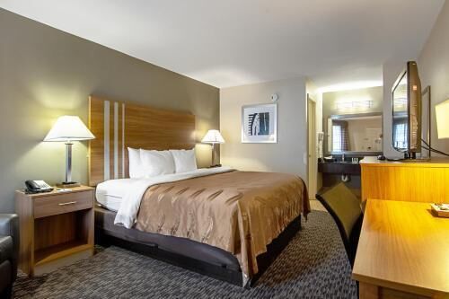 Pillowtop beds, desk, blackout drapes, iron/ironing board