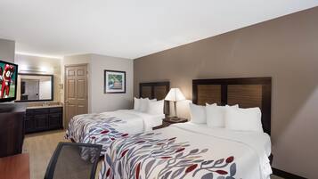 Desk, laptop workspace, blackout drapes, iron/ironing board