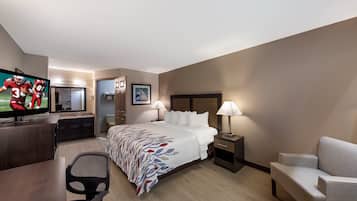 Desk, laptop workspace, blackout drapes, iron/ironing board