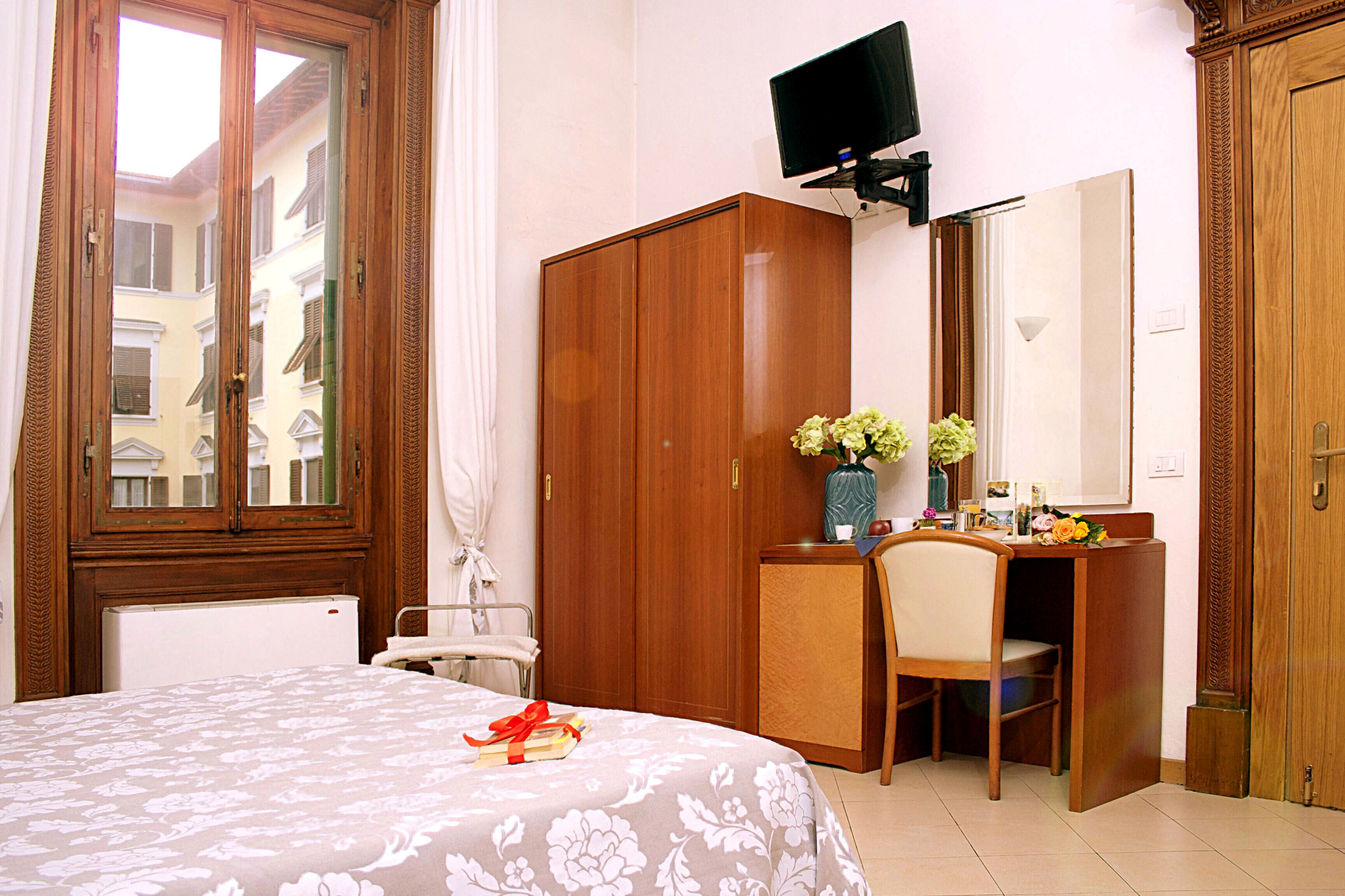 quadruple room | minibar, in-room safe, desk, laptop workspace