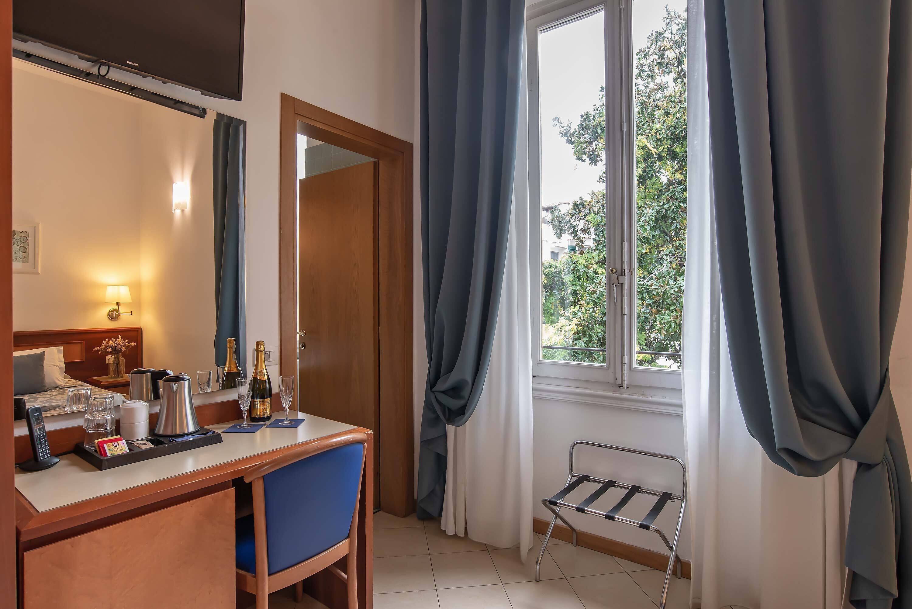 basic triple room | minibar, in-room safe, desk, laptop workspace