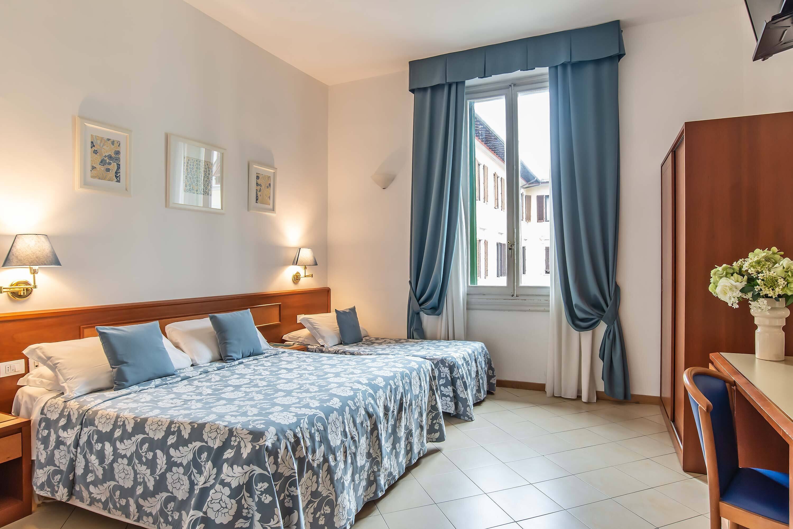 quadruple room | minibar, in-room safe, desk, laptop workspace