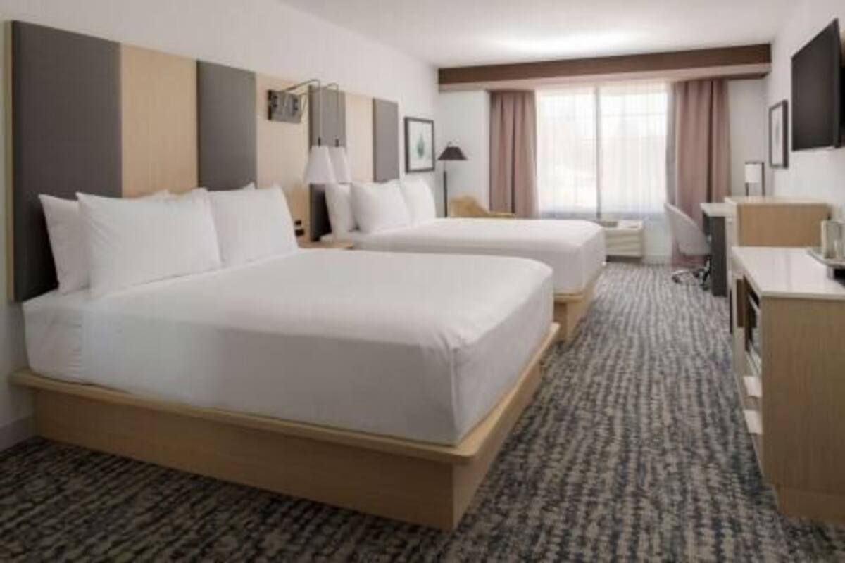 Premium bedding, blackout drapes, iron/ironing board, free WiFi