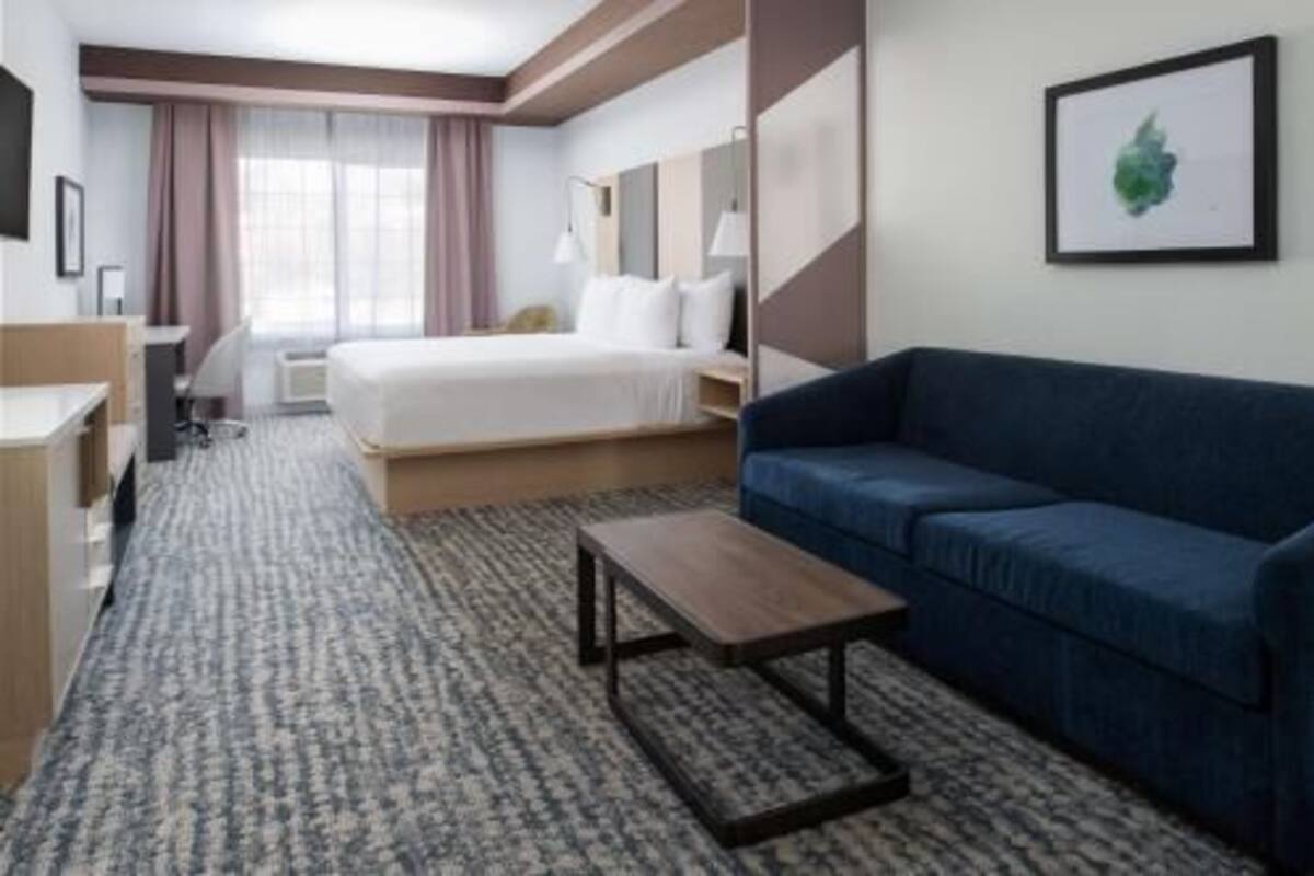 Premium bedding, blackout drapes, iron/ironing board, free WiFi