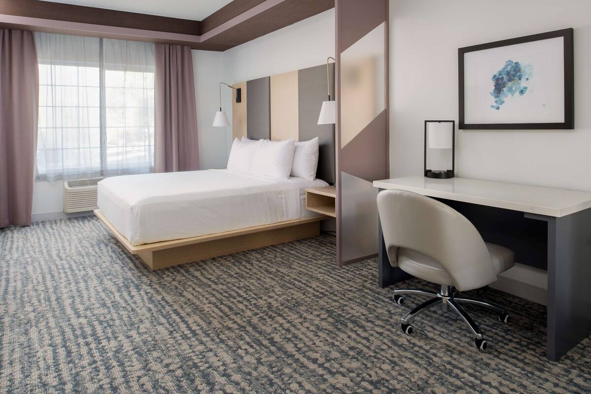 Premium bedding, blackout drapes, iron/ironing board, free WiFi