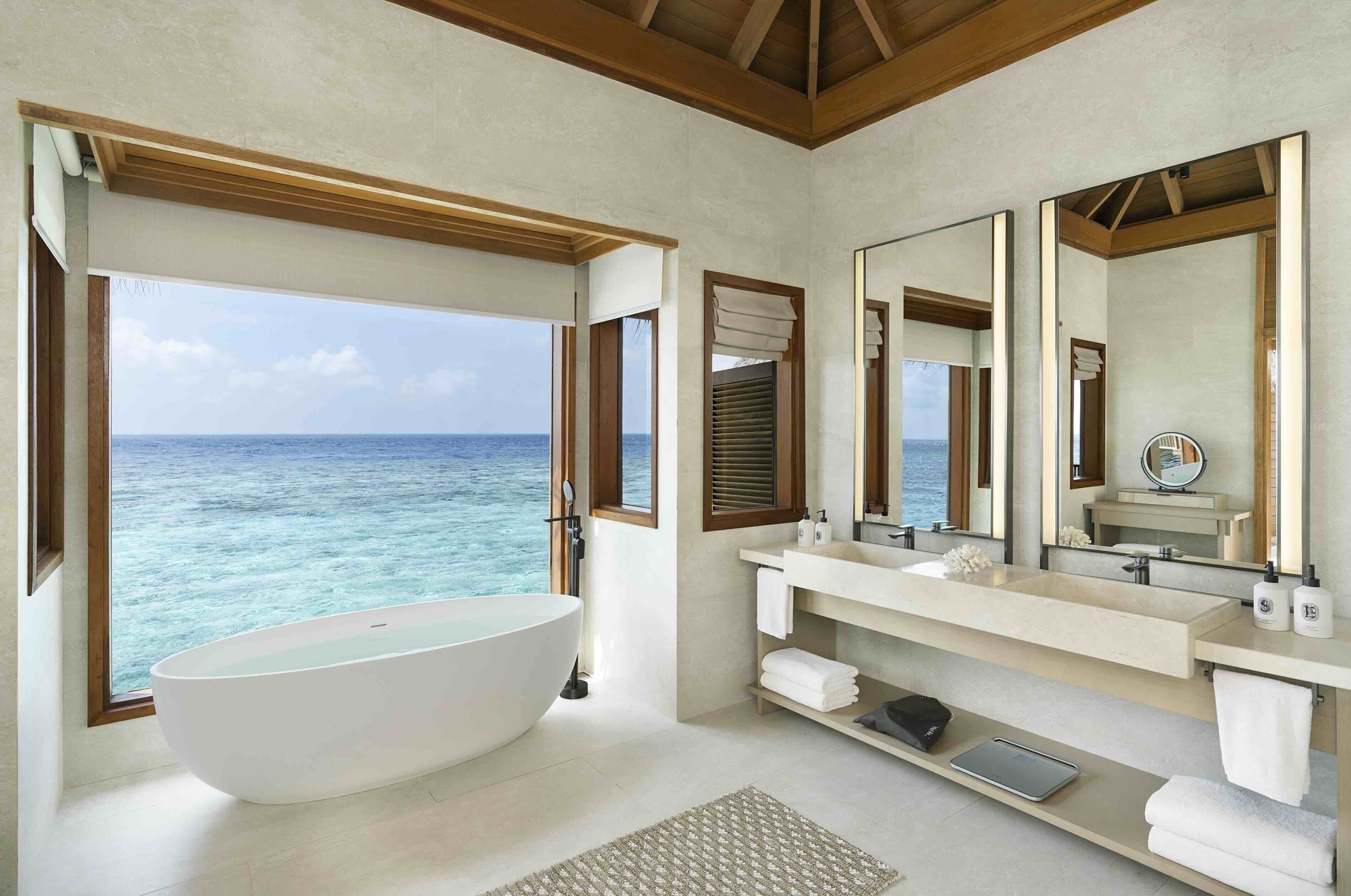 ocean bungalow with pool | bathroom | combined shower/bathtub, rainfall showerhead, designer toiletries