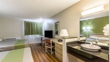 Desk, laptop workspace, free WiFi, bed sheets