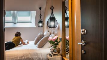 Chambre Confort | Literie de qualité supérieure, coffres-forts dans les chambres