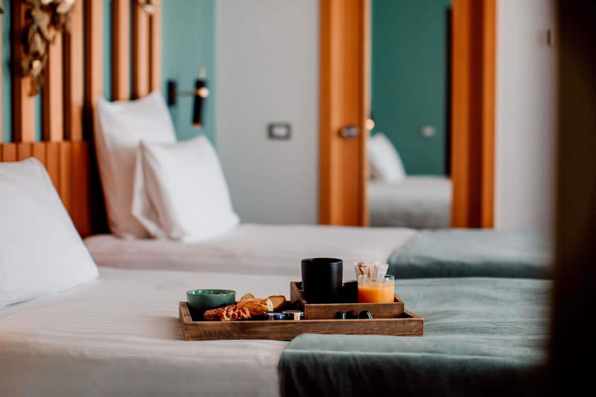 Premium bedding, down comforters, minibar, laptop workspace