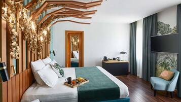 Premium bedding, down duvets, minibar, in-room safe