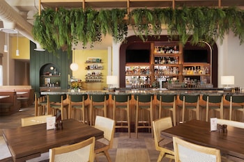 Bar (on property) at  The Ambassador Hotel of Waikiki, Tapestry Collection by Hilton