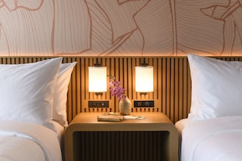 In-room safe, individually decorated, individually furnished, desk at Romer Waikiki at the Ambassador