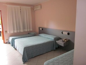 Triple Room, 1 Bedroom, Private Bathroom | Minibar, in-room safe, cots/infant beds, free WiFi