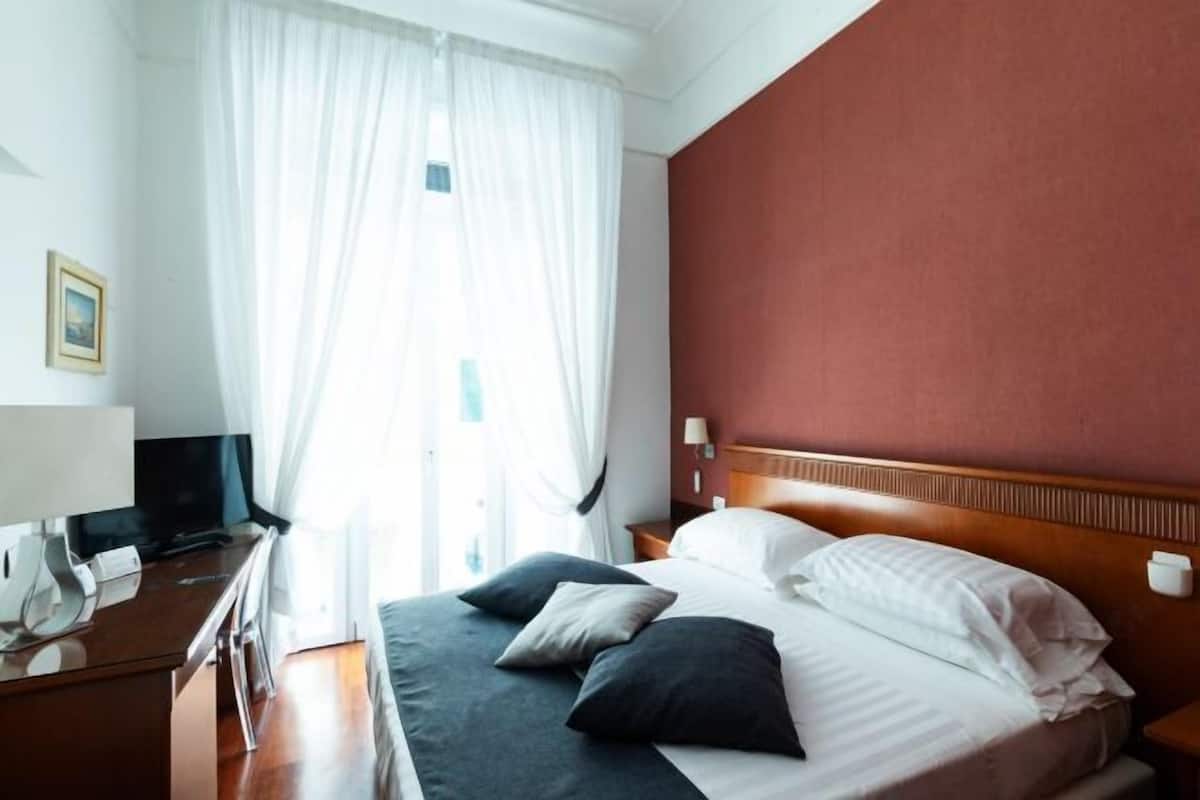 Down duvets, minibar, in-room safe, desk