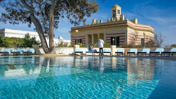Seasonal outdoor pool, pool umbrellas, pool loungers