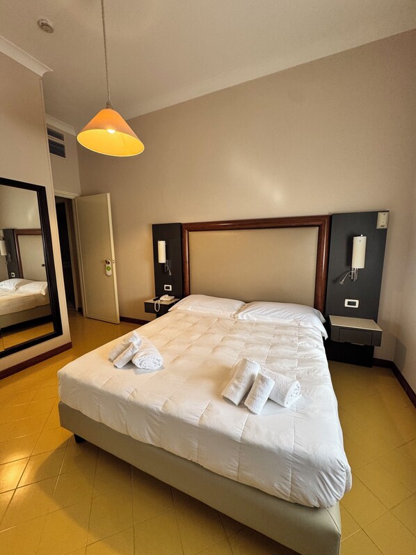 Premium bedding, down duvets, minibar, in-room safe